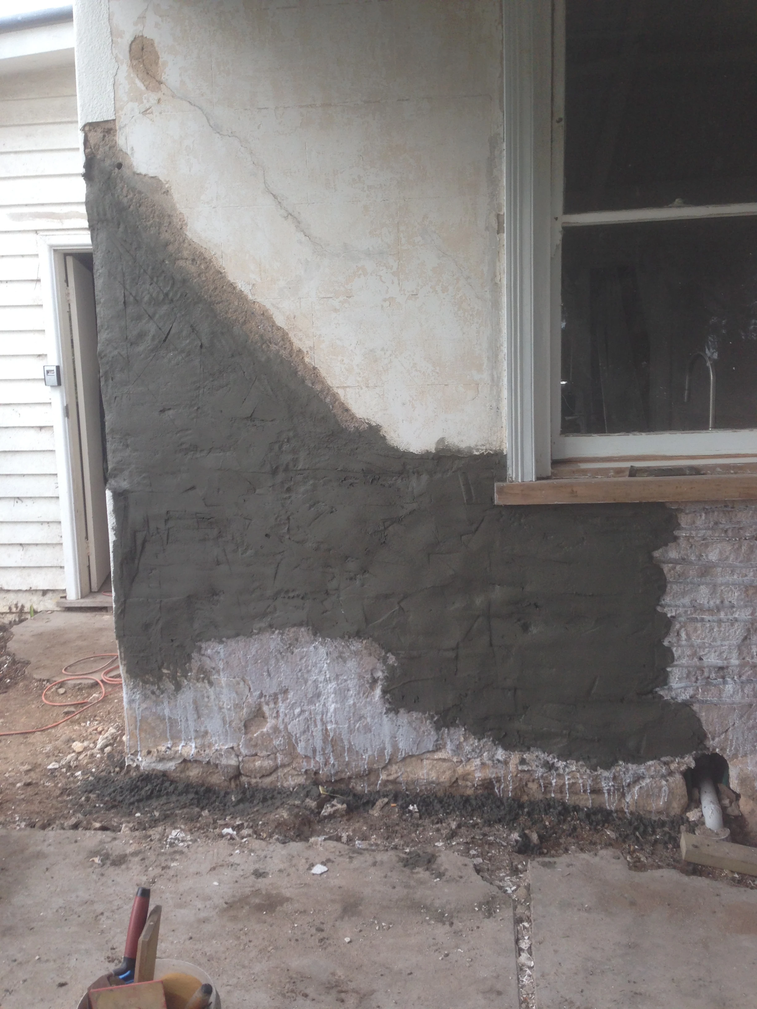 Minor carpentry and plaster repair before repainting